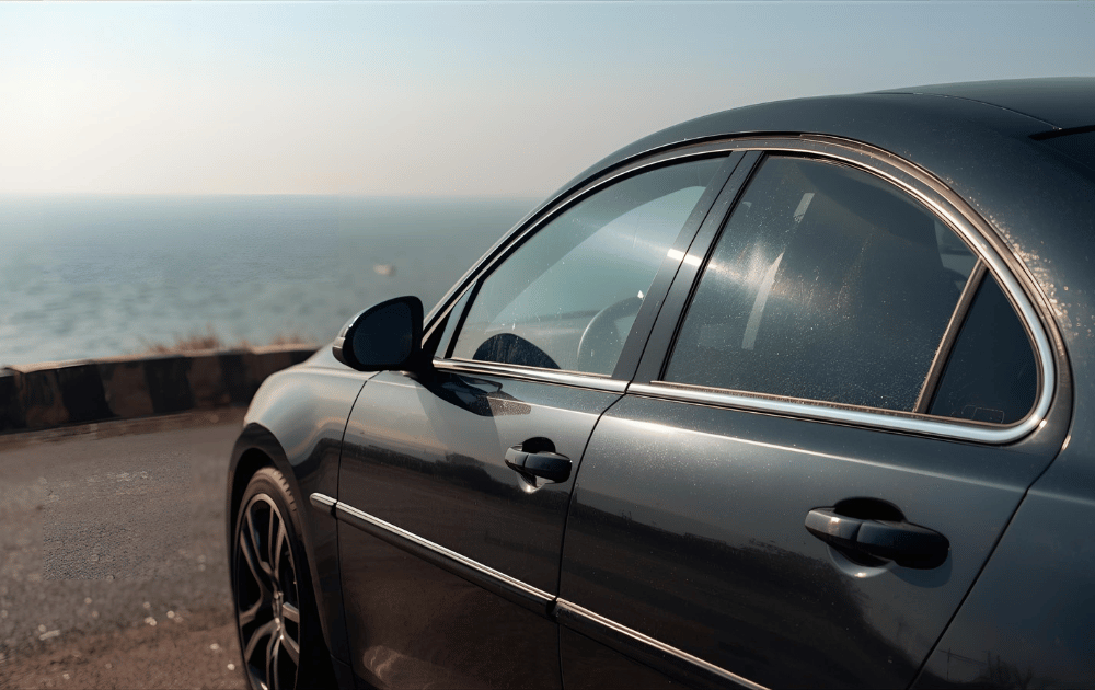 Car parked near Indian coast with anti-corrosion protection film.